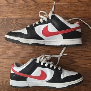 Nike Black and White Sneakers with Red Swoosh